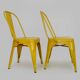 Pair of Tolix Chairs in yellow metal by Xavier Pauchard