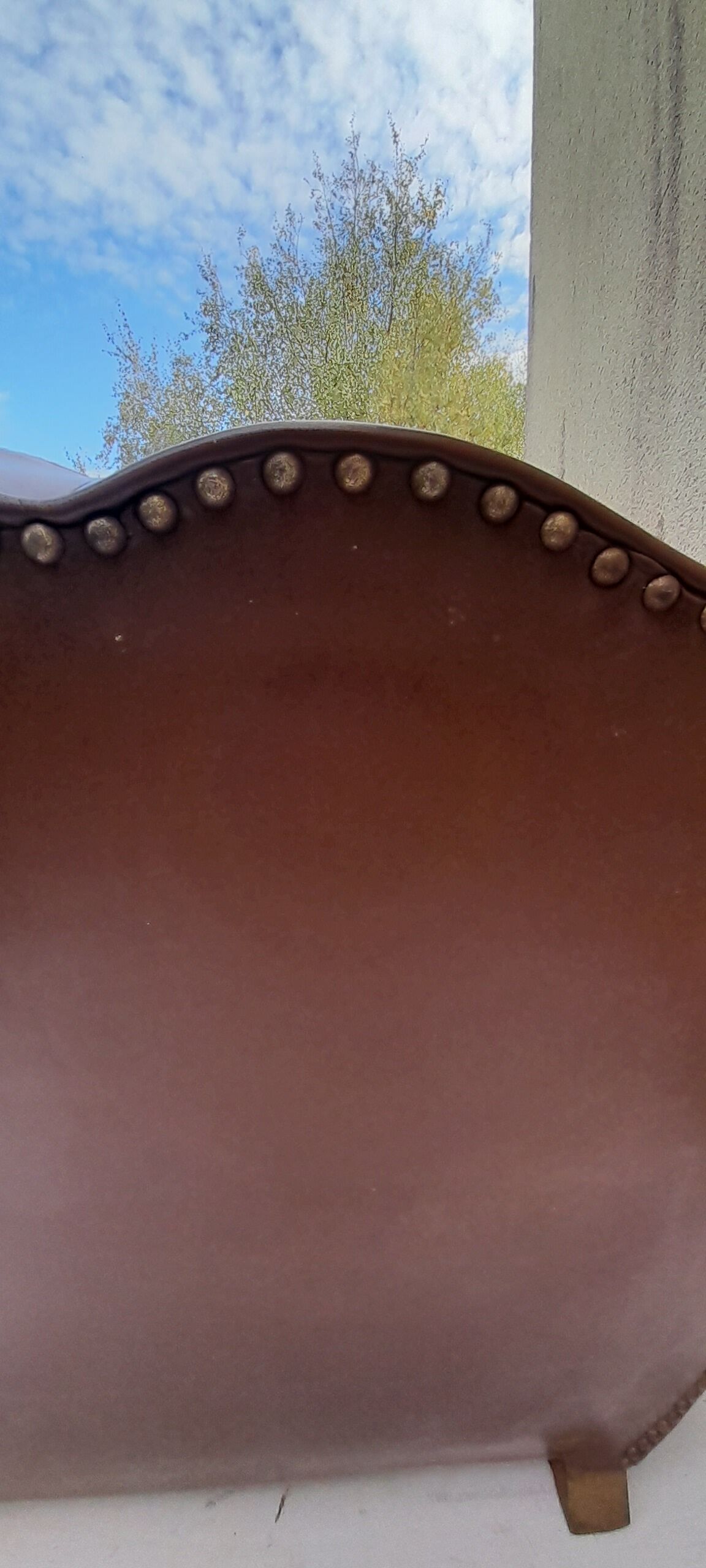 Club armchair in brown skai back mustache