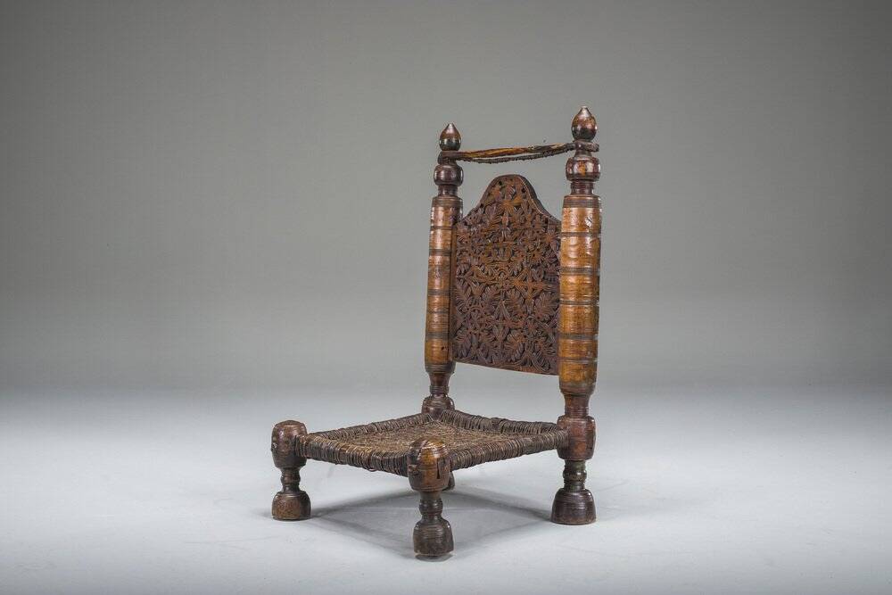 Early 20th century handmade low cedar chair, Nuristan, 1890s