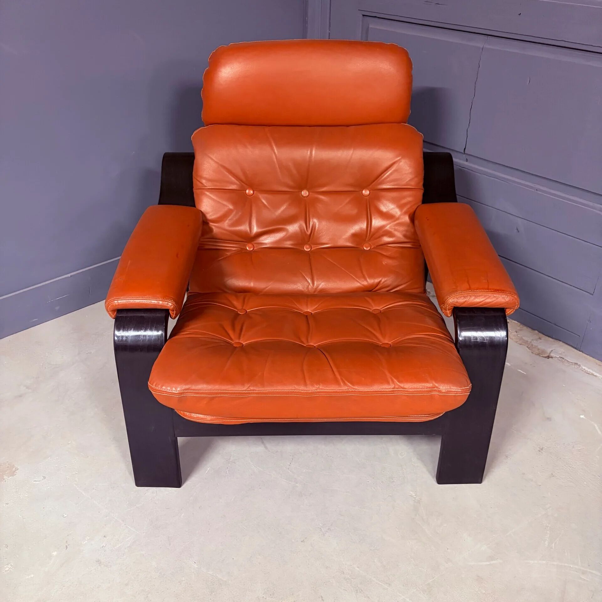 Vintage 1970s armchair with ottoman, leather and wood