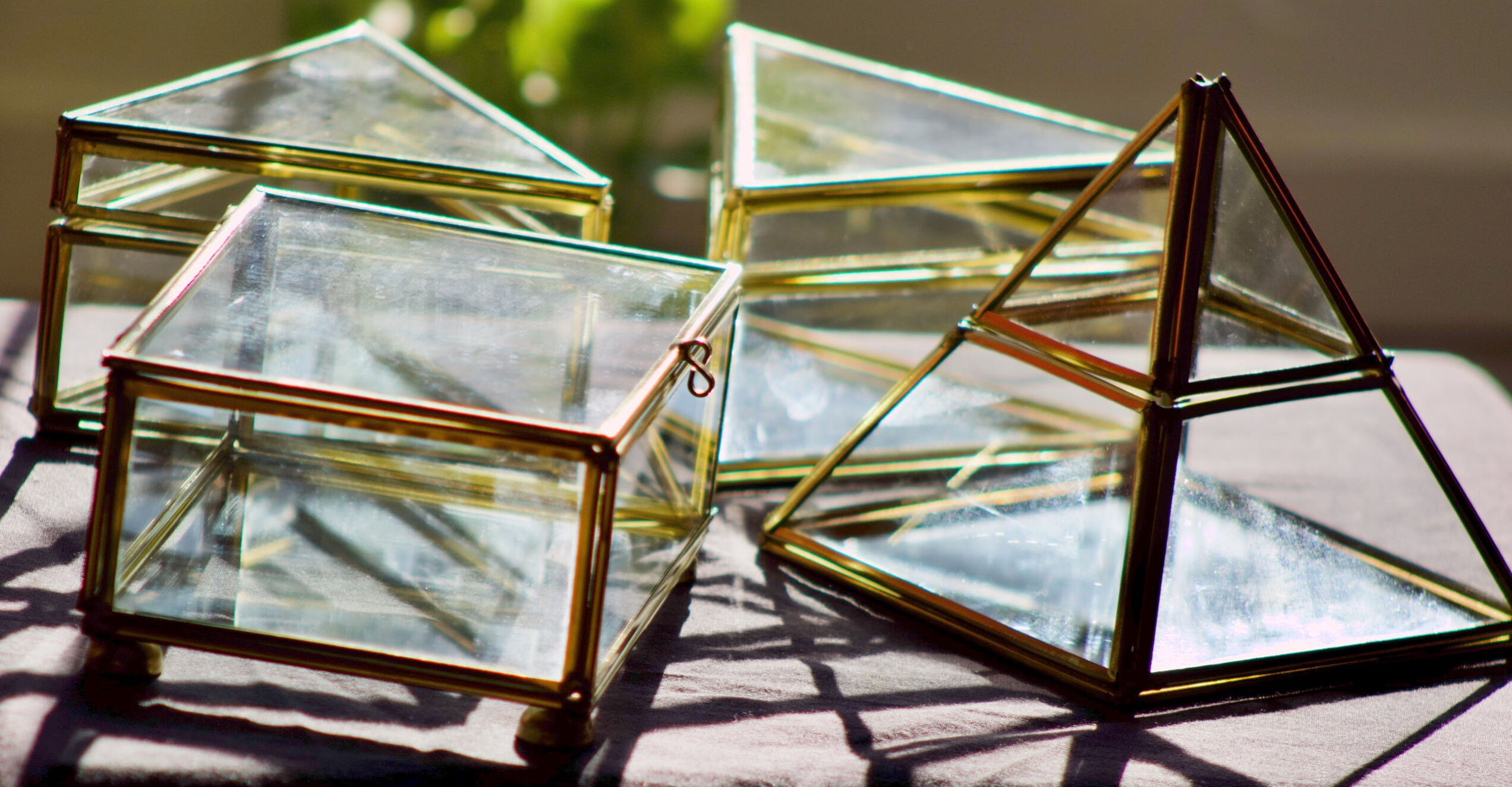 4 old glass, brass and mirror jewellery boxes