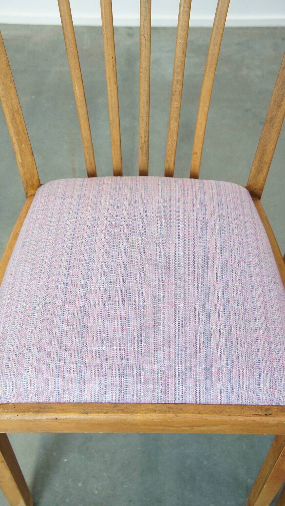 Set of four dining chairs from the 1970s with fabric seat and wooden frame