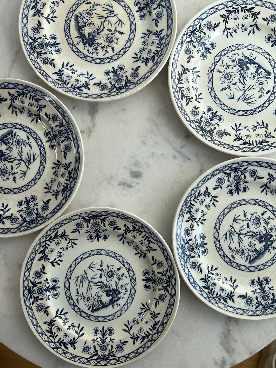 Set of five Lunéville KG Delet dessert plates.
