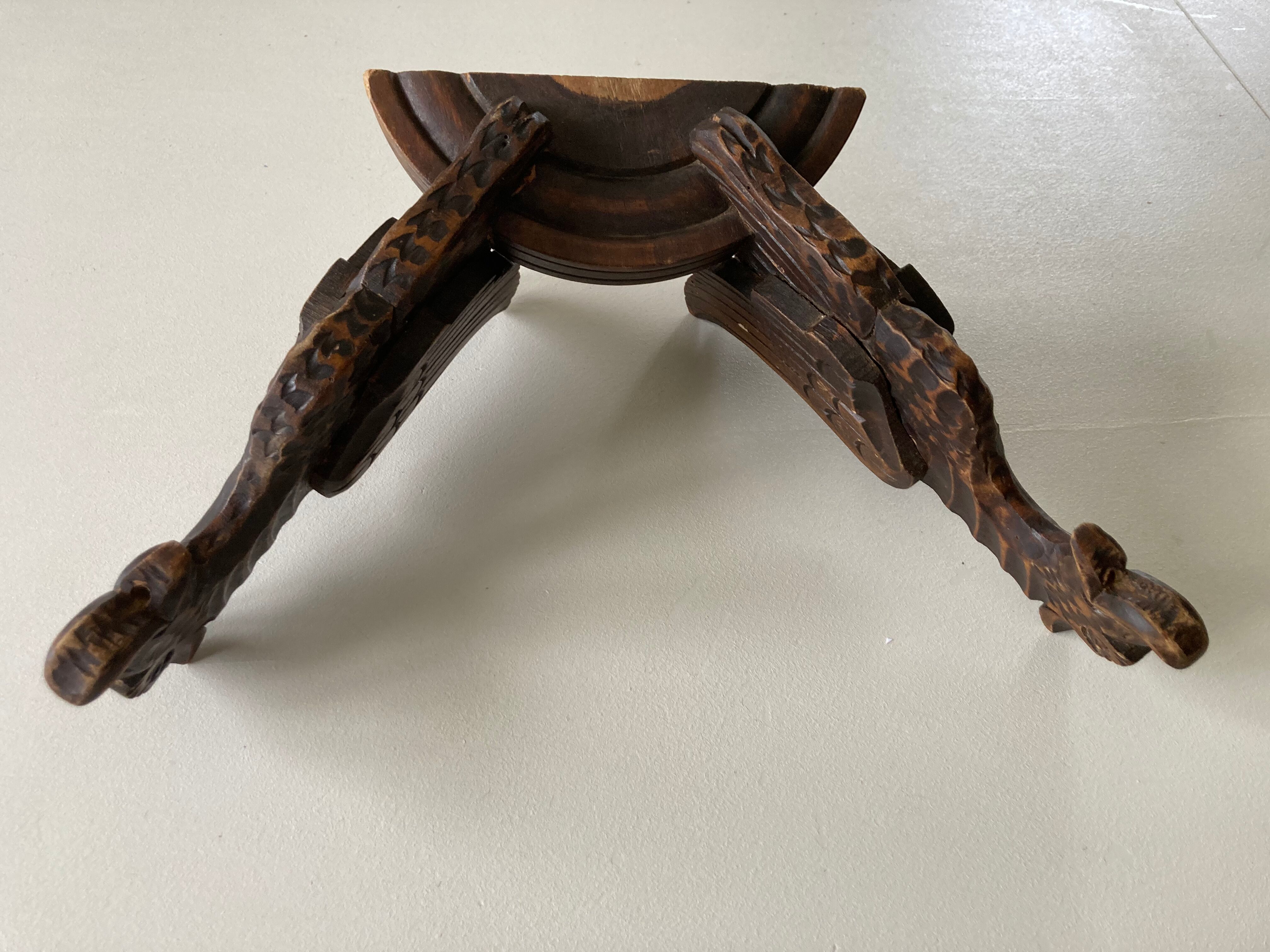 Pair of winged dragon sconces in carved wood