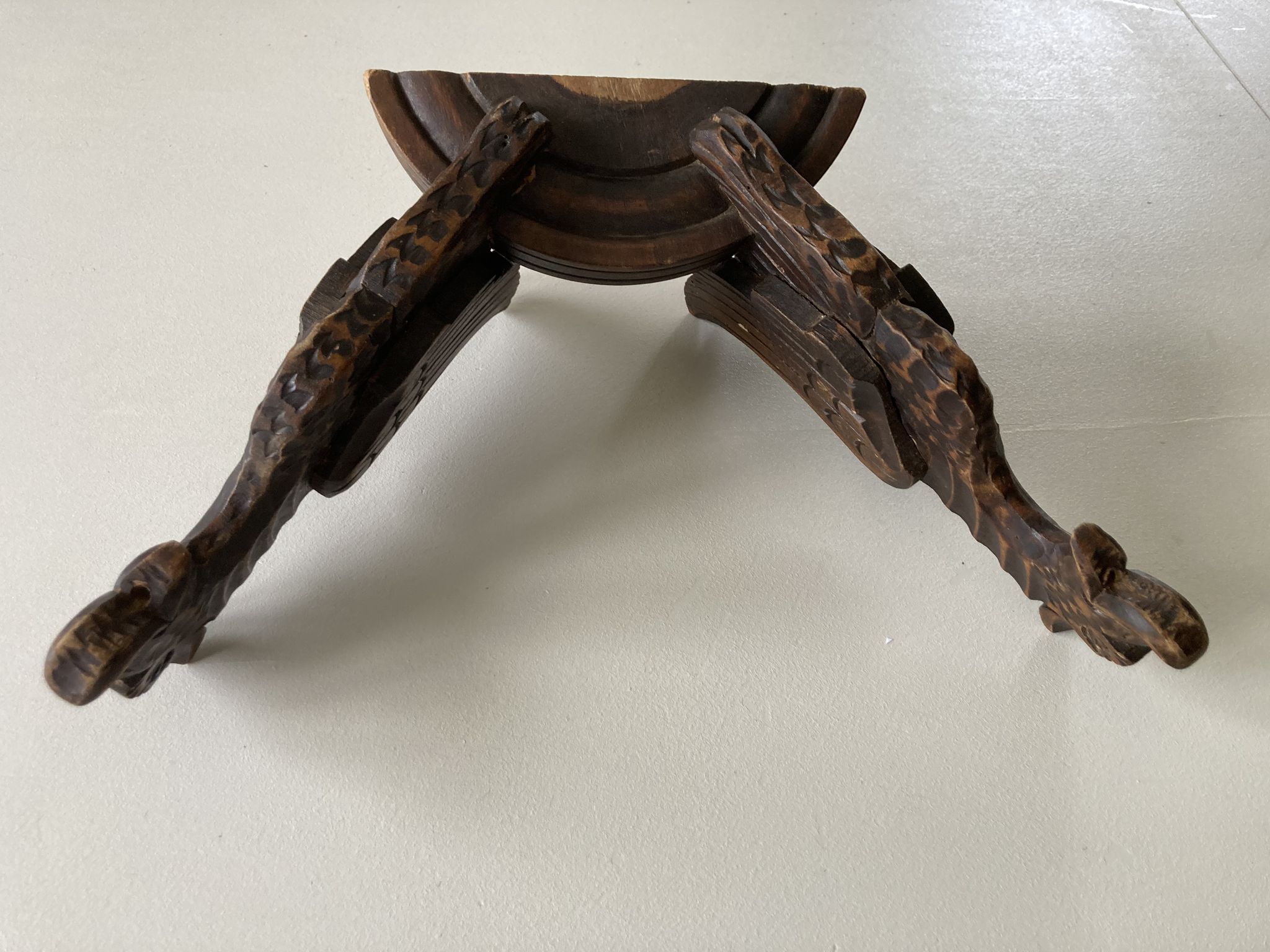 Pair of winged dragon sconces in carved wood