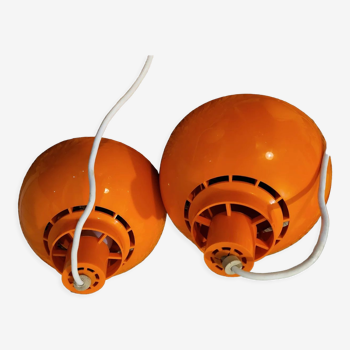 2 orange Solar minosl pendant lights by K. Kewo