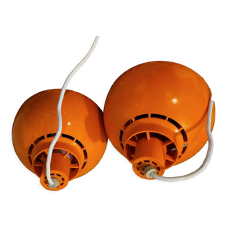 2 orange Solar minosl pendant lights by K. Kewo