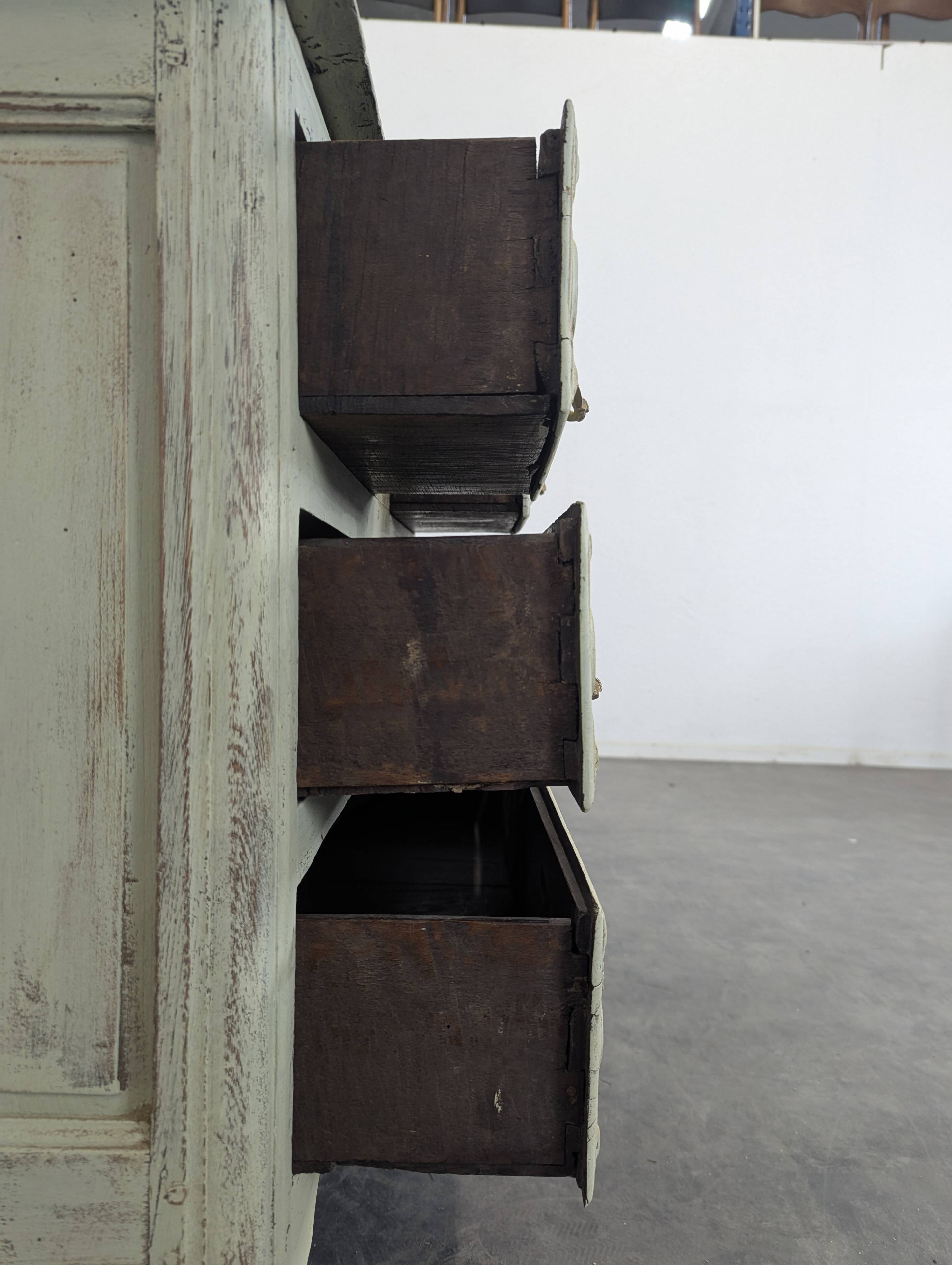 Louis XIV period chest of drawers with repainting