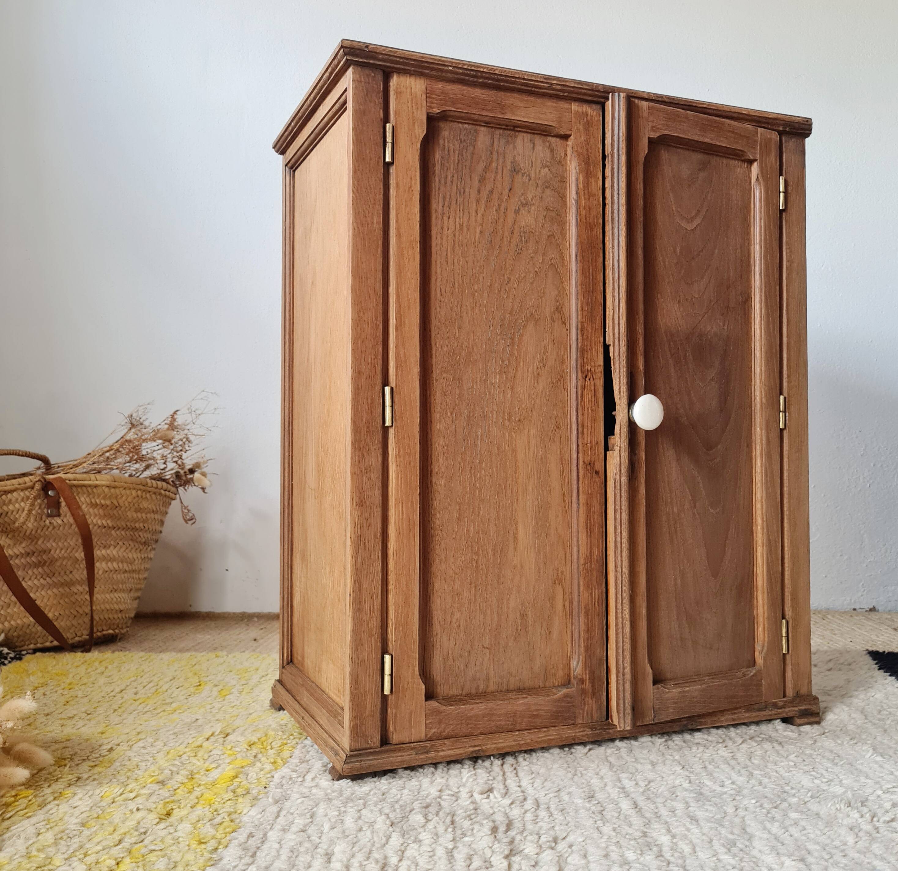 Small Parisian oak wardrobe with its porcelain knob.