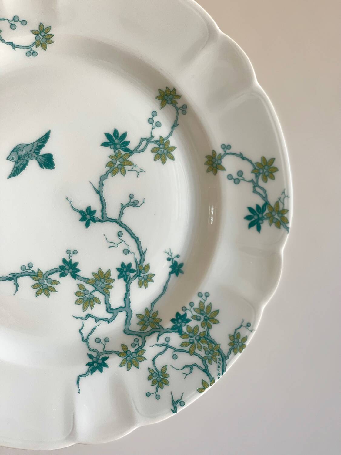 8 Haviland Limoges dinner plates.