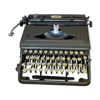 Triumph perfekt typewriter with its transport box.