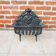 Antique black cast iron log cradle in rococo style