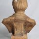 Bust of a notable in terracotta, 29 cm, signed Pasquet, 1870, on a base.