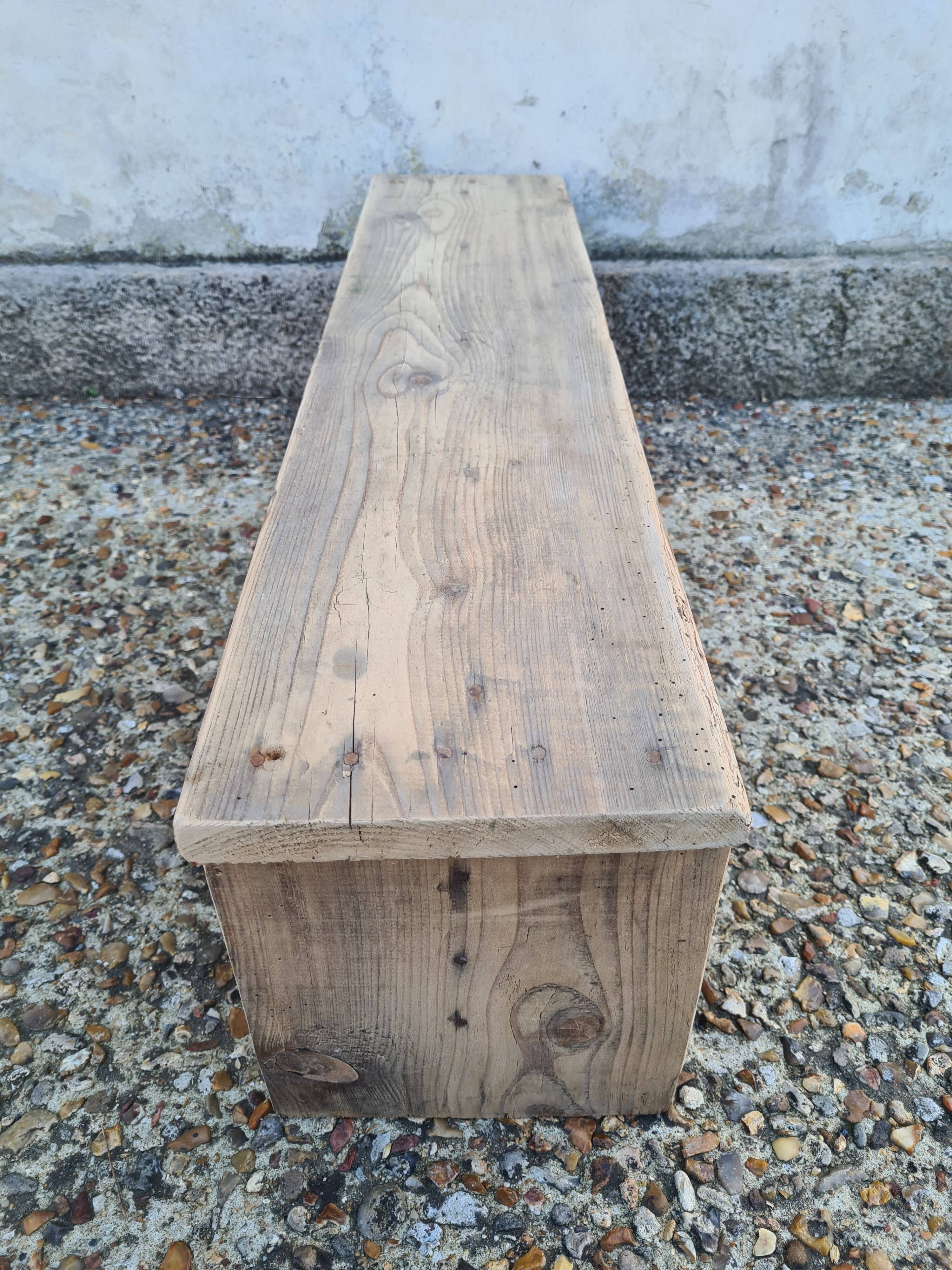 Small raw wood bench