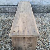 Small raw wood bench