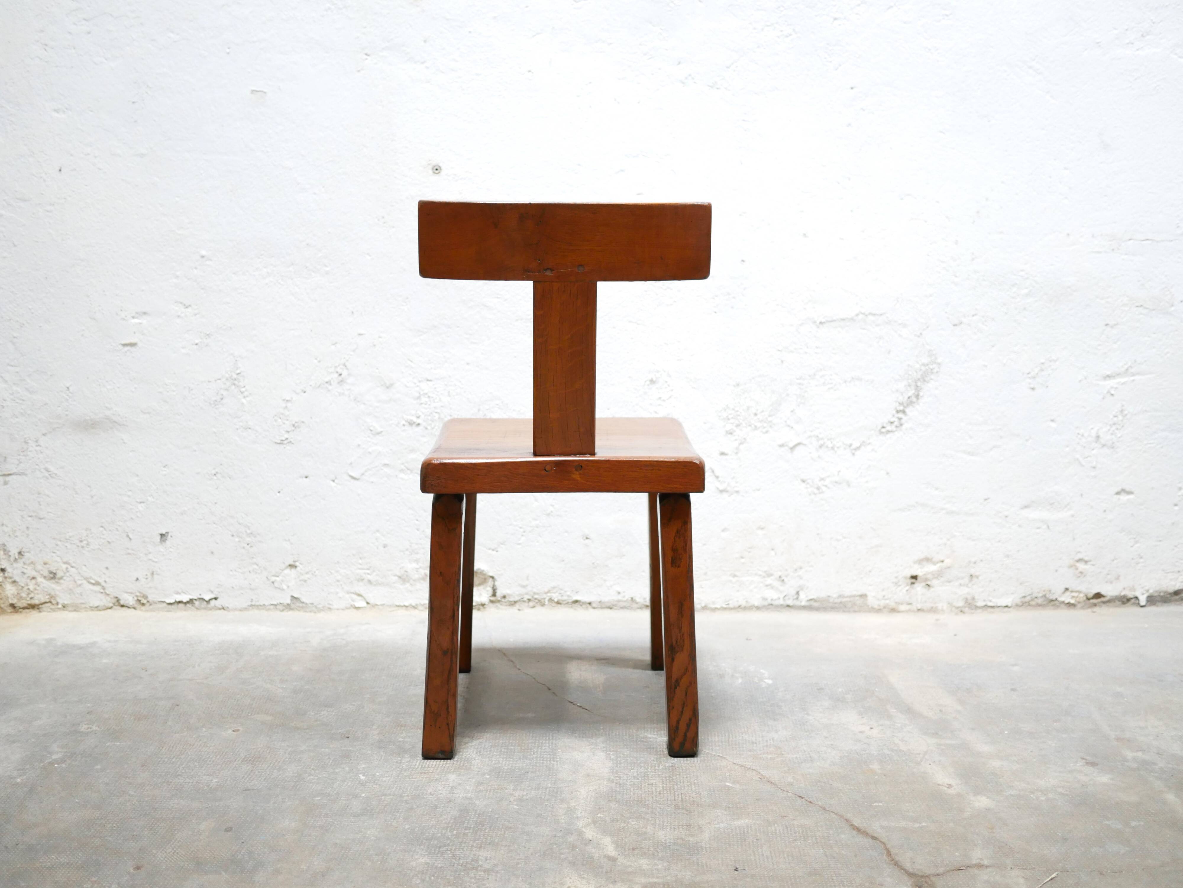 Vintage brutalist wooden T chair