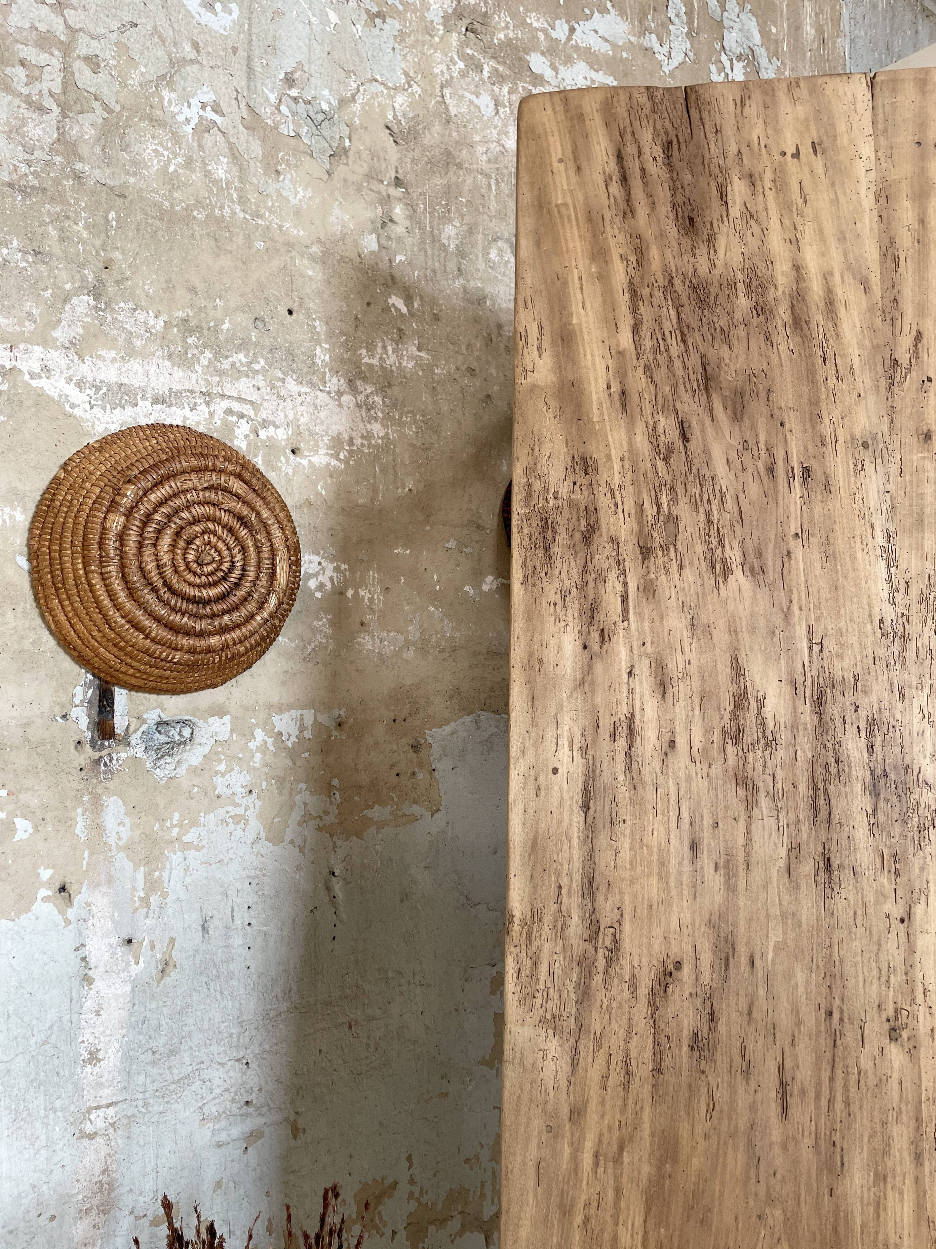 Vintage farm table with spindle legs.