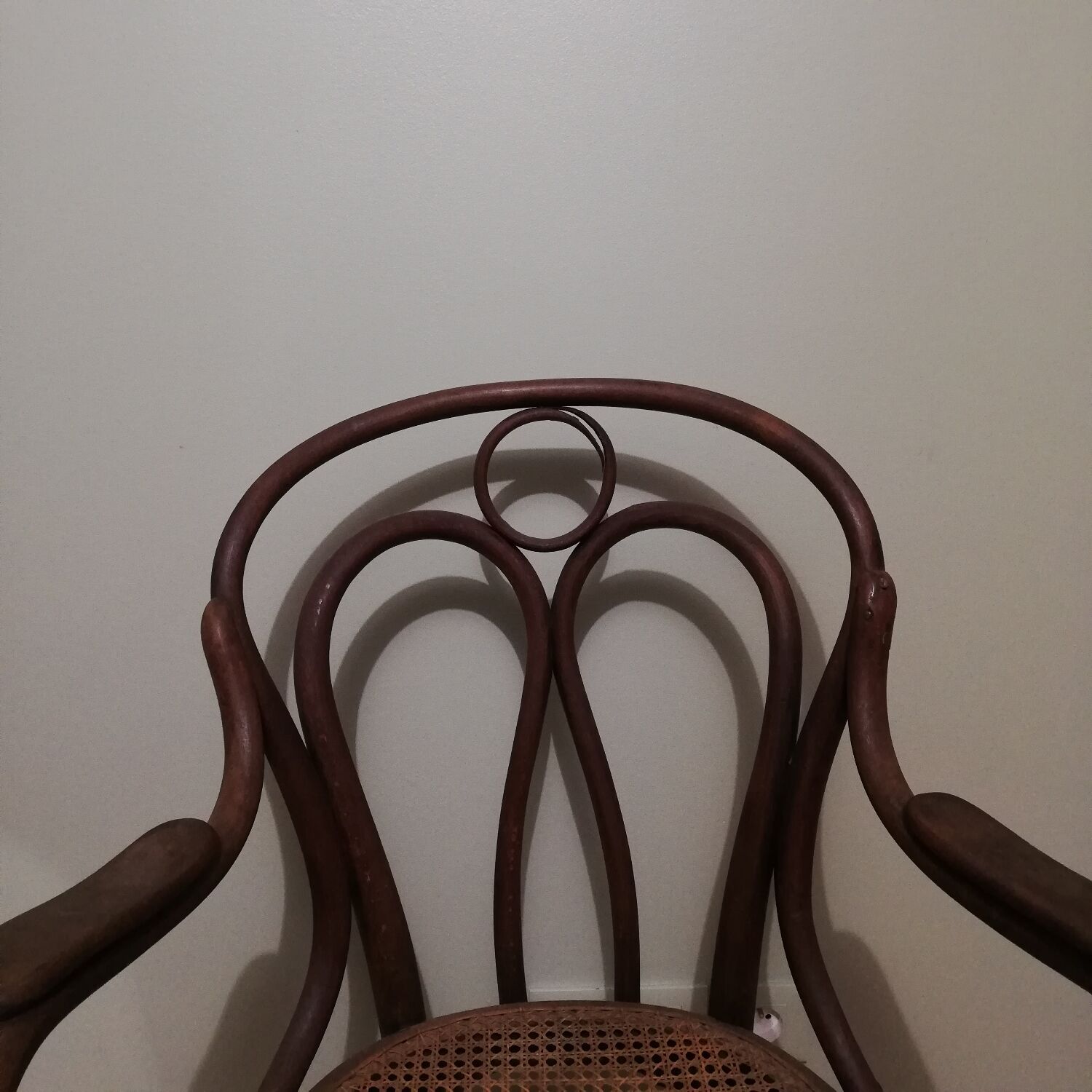 Canned armchair in curved wood signed J.Kohn