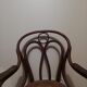Canned armchair in curved wood signed J.Kohn