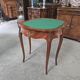 Half-moon gaming table in Louis XV style, made of precious wood marquetry.