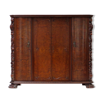 Hand carved burr walnut wardrobe armoire with lion claw / paw feet, 19th century