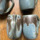 Set of 4 cups and 1 signed brutalist tray.