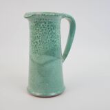 Large green ceramic pitcher with leopard enamel