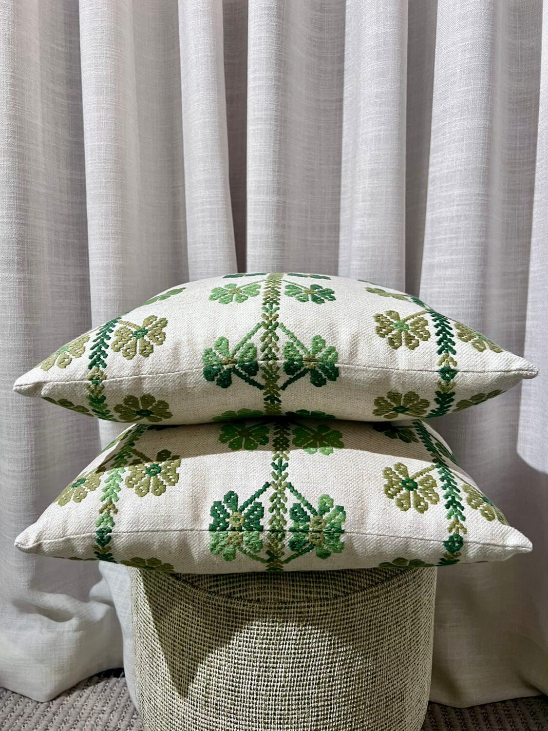 Custom cushions with green clover patterns.