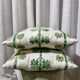Custom cushions with green clover patterns.