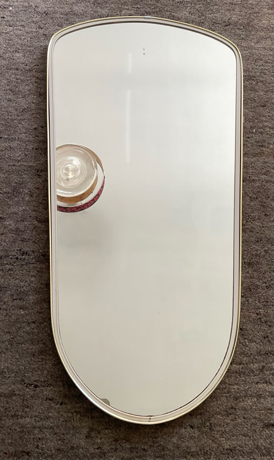 Asymmetrical free-form mirror from the 60s-70s.
