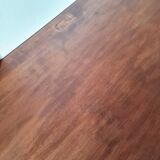 Metal tubular base table with a wooden top.