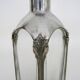 Magnificent crystal and silver-plated metal carafe bottle.
