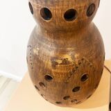 Terracotta lamp with cut-outs, circa 1970.