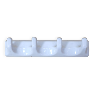 Tea towel holder or porcelain towel with 4 hooks.