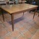 Table scandinave galbée extensible papillon en teck années 60
