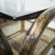 Side table in rattan and smoked glass