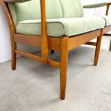 Two-seater sofa from the sixties with green upholstery