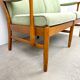 Two-seater sofa from the sixties with green upholstery