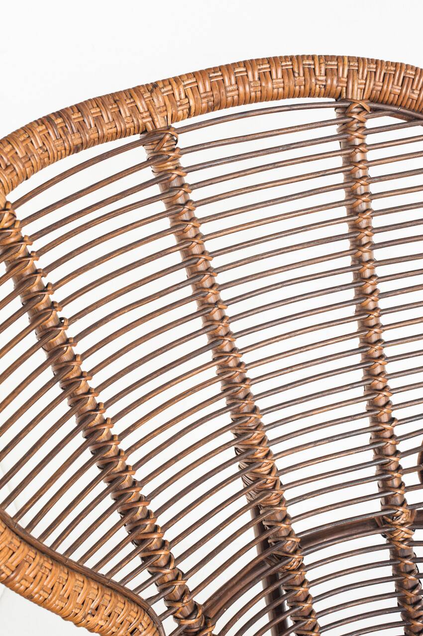 Vintage high armchair in cane/rattan. France, 1960s