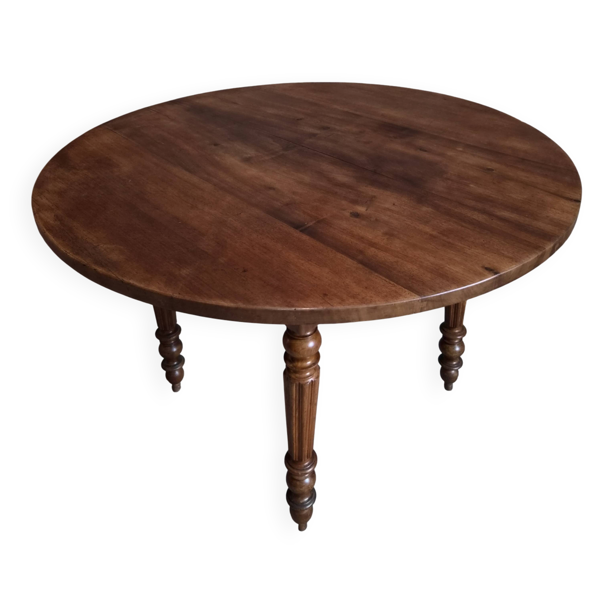 French antique round dining table in walnut, circa 1880–1900.