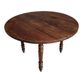 French antique round dining table in walnut, circa 1880–1900.
