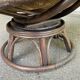 Fauteuil pivotant en rotin et coussin velours marron années 70