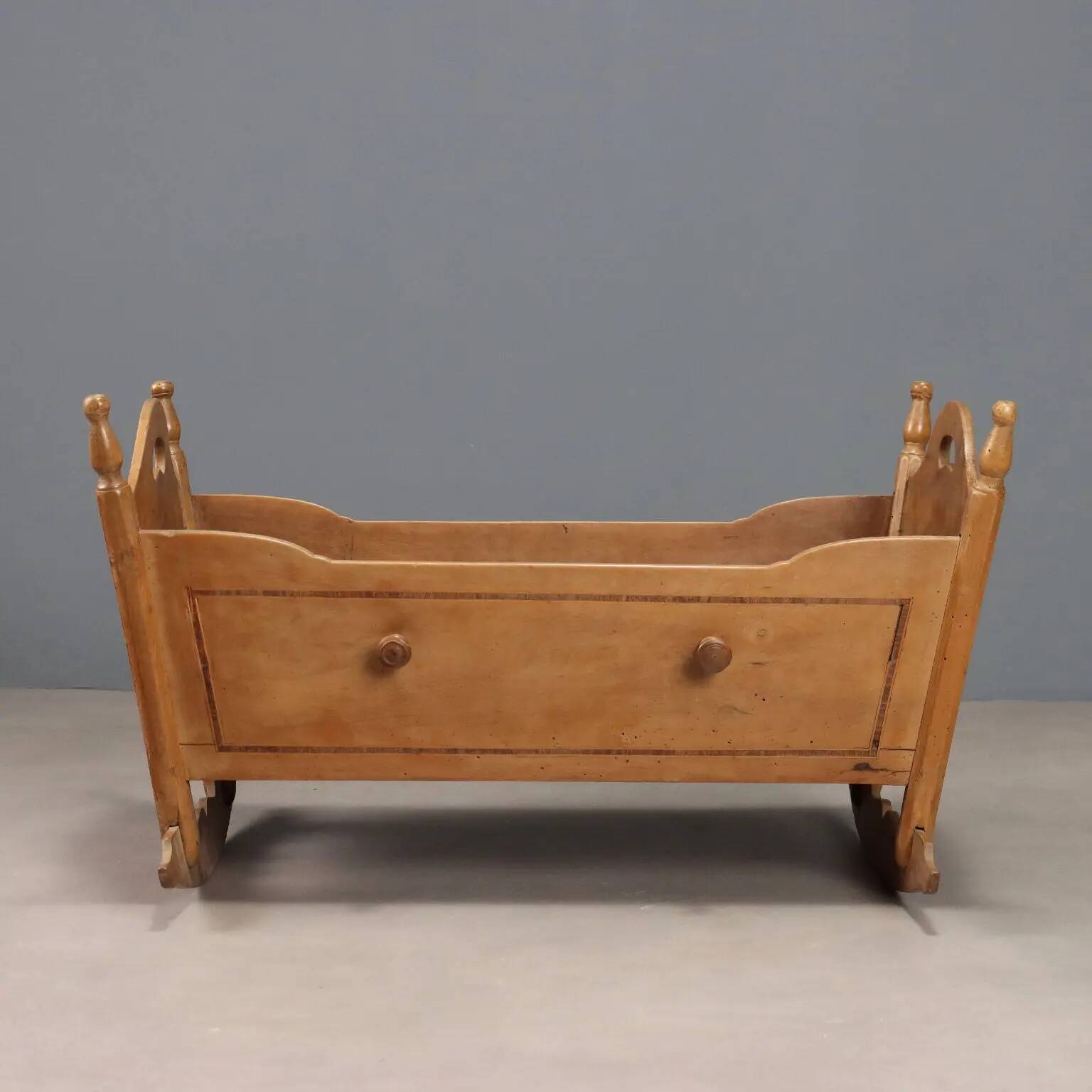 Antique cradle made of fruitwood and maple, Italy, 20th century