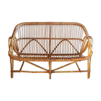 Bench into rattan of the 1960s