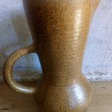 Vintage pitcher with enamelled earth cove