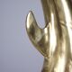 Solid brass dolphin console feet.
