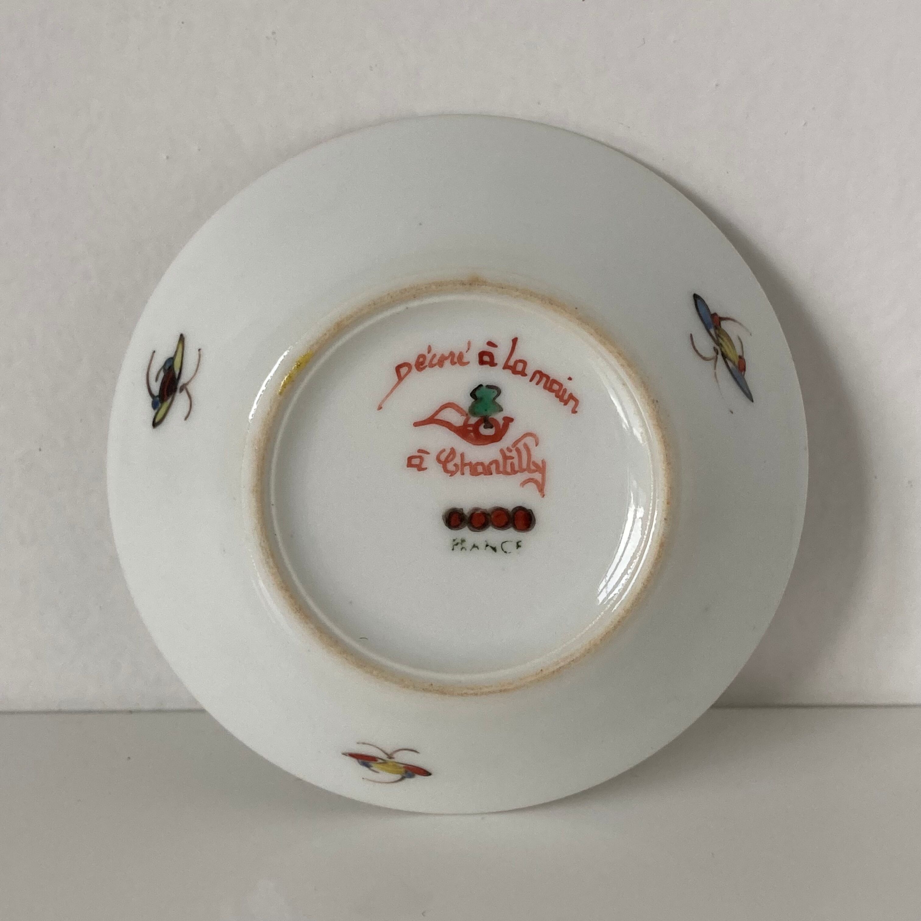 Limoges porcelain cup and sub-cup decorated in Chantilly in the Japanese Kakiemon style