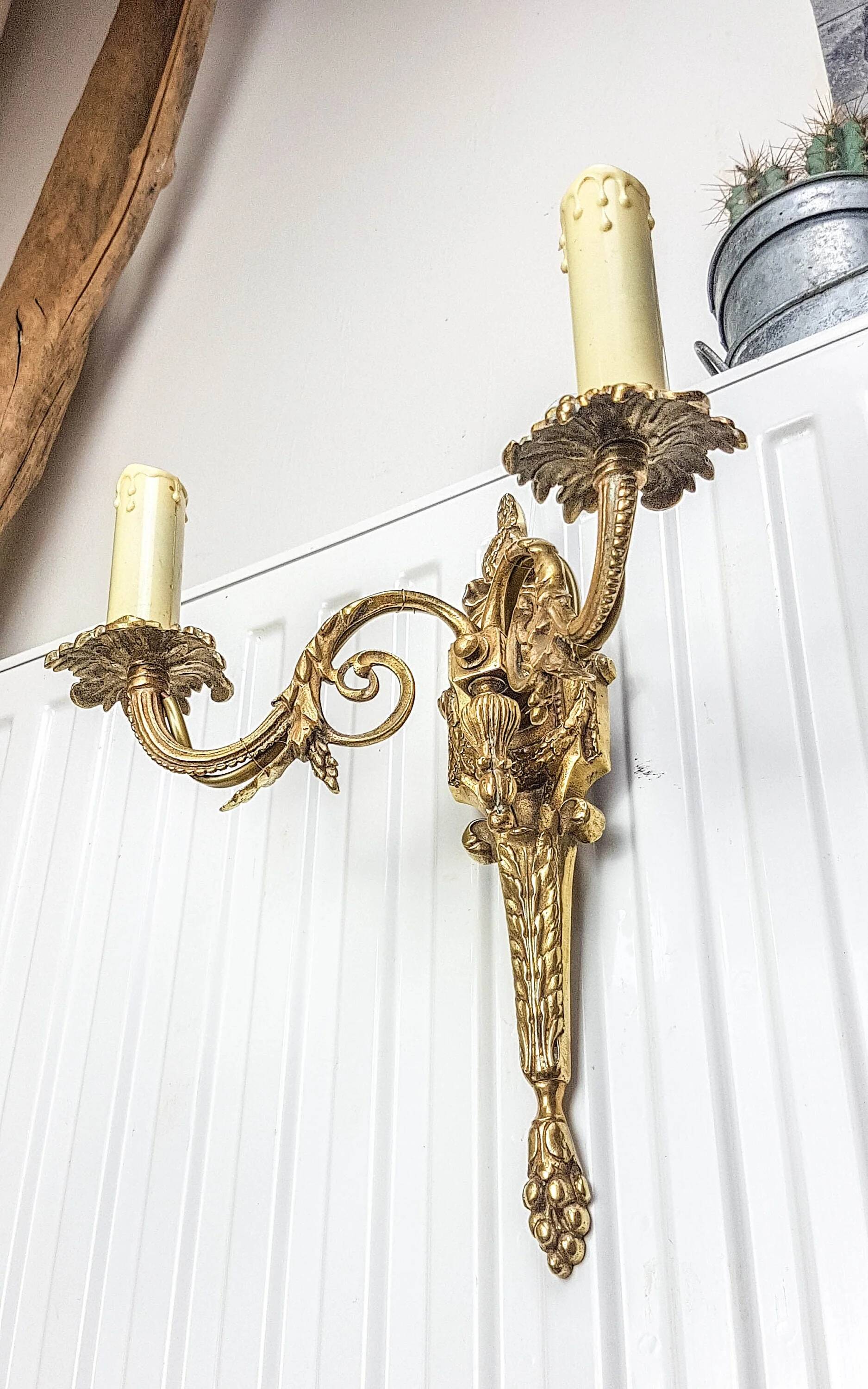 Bronze wall sconce in Empire style