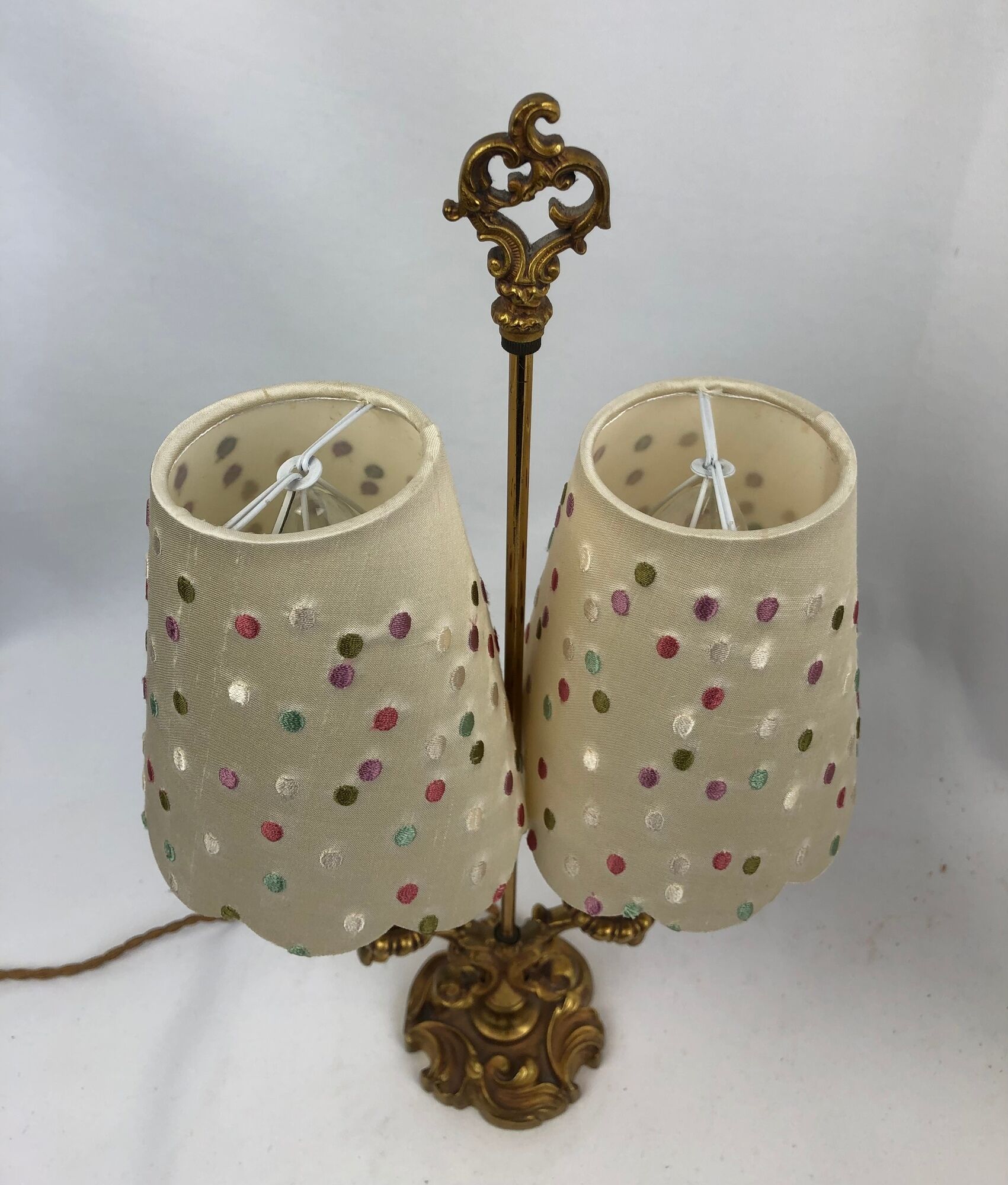 Pair of antique hot water bottle lamps in gilded bronze