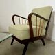 Set 2 old designer fireside chairs from the 50s wood and vintage fabric